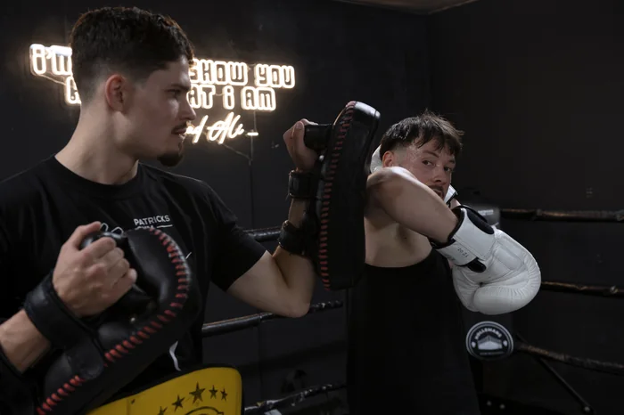 Elbow drill in the corner of the ring